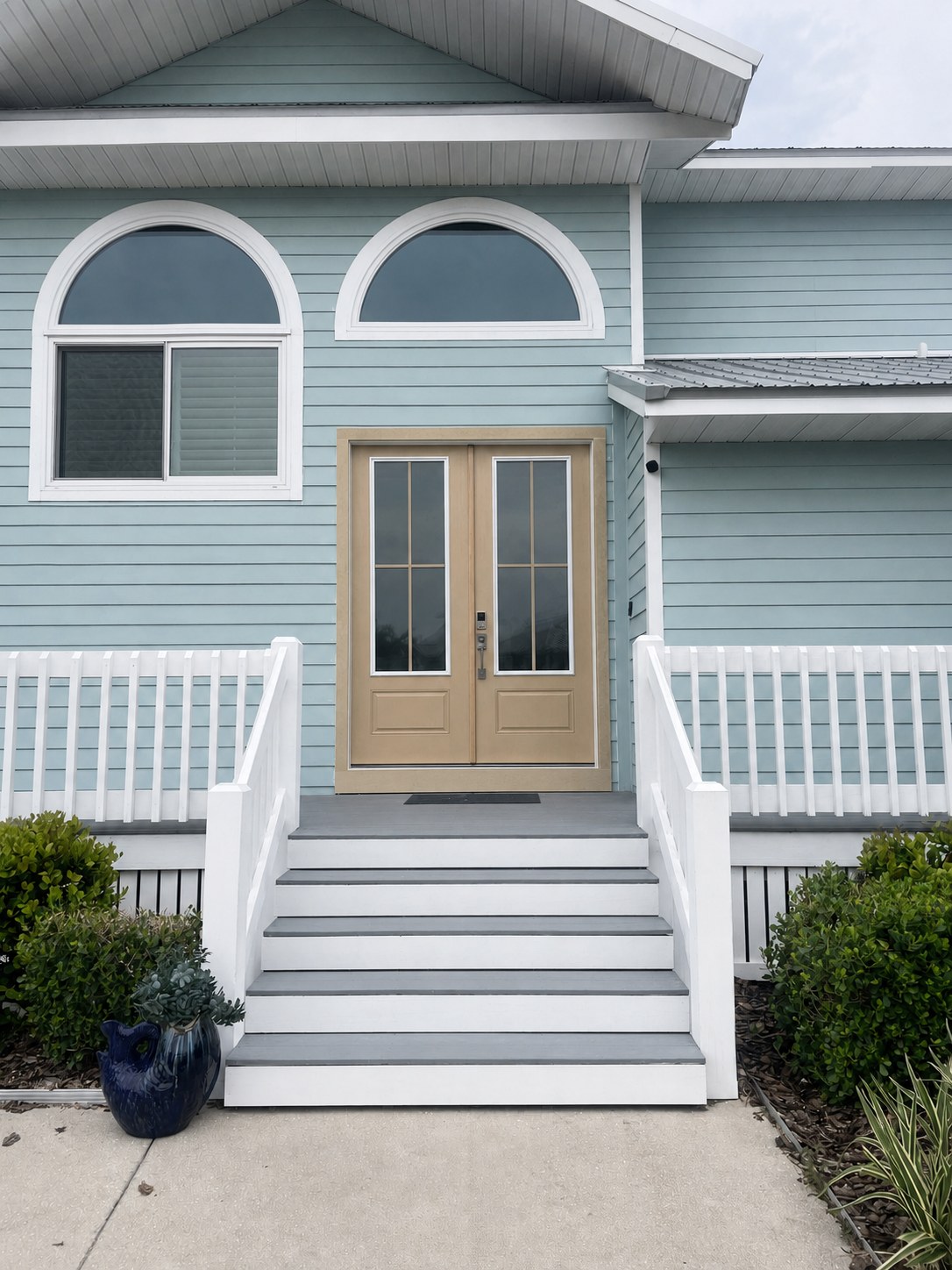 Completed glass-panel double entry door installation on a Palmetto Florida home