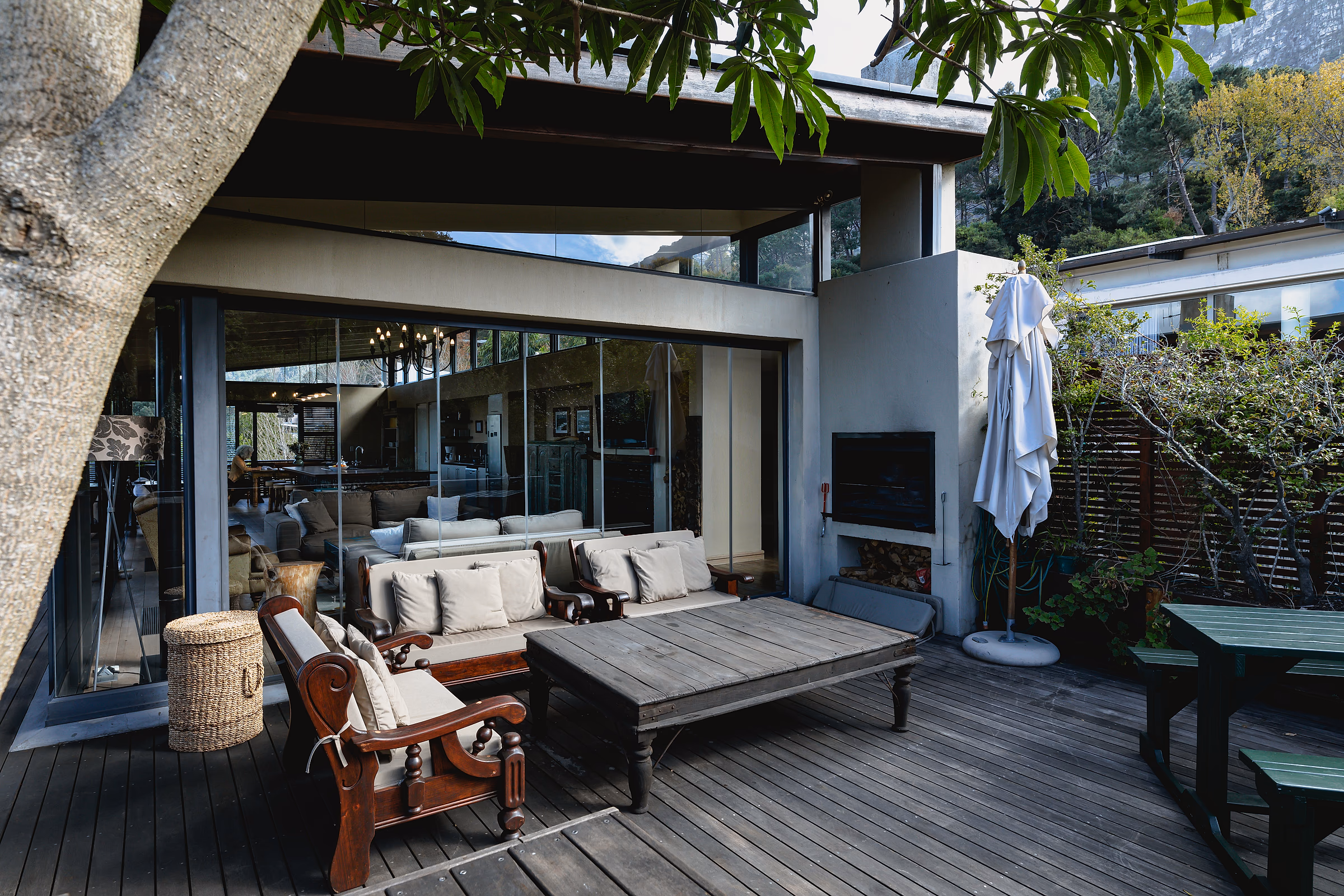 Newly finished outdoor living area with a covered terrace and landscaped garden